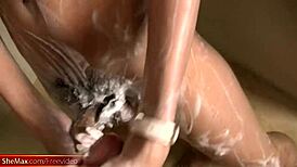 Exotic ladyboy in black lingerie strikes a pose