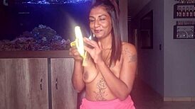 Topless Desi Squeezes Boobs While Deepthroating Banana!