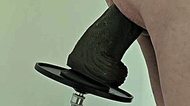 Watch that monster black dildo fuck my ass on the machine!