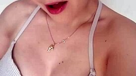 Teen brunette with blue eyes and piercing teases by the pool before swimming.