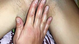 her wet pussy swallows my fingers in lesbian play