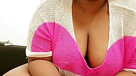 this sexy girl with big tits is just hanging out, showing off her curves in a casual way