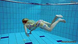 Petite teen Milana Voda braves naked underwater swim session