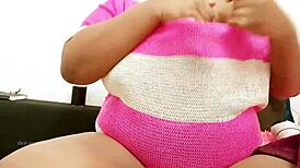 this sexy girl with big tits is just hanging out, showing off her curves in a casual way