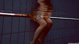 Petite teen Milana Voda braves naked underwater swim session