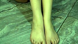 i'm showing my pretty feet, soles, and nails while walking naked and barefoot in the bedroom with bugs bunny blue nails