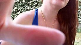 Nicoletta in her rich garden trying earrings, feeling so excited for ear lovers