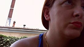 Nicoletta in her rich garden trying earrings, feeling so excited for ear lovers