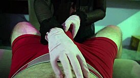 A fetish hospital handjob with pink gloves and belly is up next