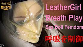 fetish leather girl in bondage play, wrapped in nylon, latex, hood, catsuit, and rubber for intense mummification.
