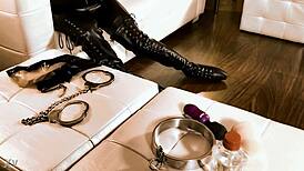 fetish leather girl in bondage play, wrapped in nylon, latex, hood, catsuit, and rubber for intense mummification.