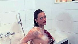 Solo bathing shemale tugs hard in tub 🛁