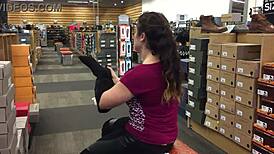 brunette babe flashes thong in public shoe shop