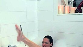 Solo bathing shemale tugs hard in tub 🛁
