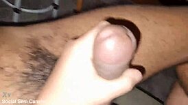The sexy twink jerks my dick but fears my thick cock in his ass, so I insert it slowly.