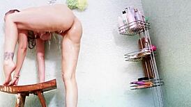 Hey, watch big-titty milf Julia Ann finger her wet pussy in shower!