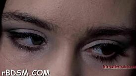 Clamped chick takes a hook in her anal. Toy punishment hits hard.