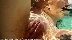 Pretty girl masturbates underwater in jacuzzi