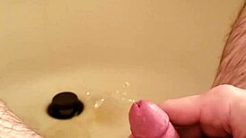 Watch this old man PISS on the shaved hairless cock with his SMALL DICK!