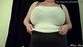 chubby brunette teases while undressing her big ass