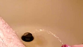 Watch this old man PISS on the shaved hairless cock with his SMALL DICK!