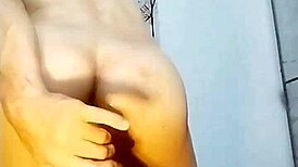 gay guy explores anal with dildo in intimate scene