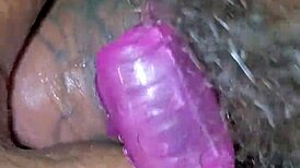 Homemade video of toothless person in intimate moment.