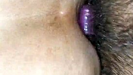 Homemade video of toothless person in intimate moment.