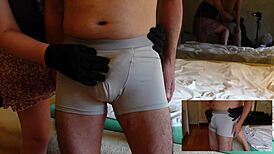 Suggestive femdom video with handjob, slapping, and edging techniques on penis