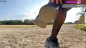 Kati's Shoeplay in Nylons with Dangling Sneakers and Bare Feet