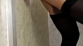 Latina uses dildo in bathroom