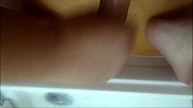 This chubby gay guy enjoys bath wanking and handjob fun