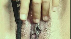 single girl jerks off condom-covered cock while on boyfriend's call 😏