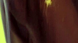 Brunette asian strips seduces while dancing nude