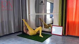 Regina Noir Stuns in Yellow Tights During Yoga Session at Gym