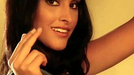 Brunette asian strips seduces while dancing nude