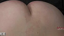 wearing a metal cage helmet for domination