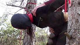 Yo, tied her up outdoors in pantyhose and boots for a rough bang! 😈