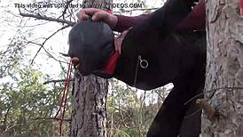 Yo, tied her up outdoors in pantyhose and boots for a rough bang! 😈