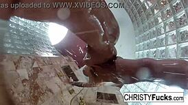 Steamy shower turned wild with Christy, Dahlia, and Ivan enjoying hot lesbian play. Their tattooed bodies glistened under water.