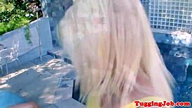 Teen amateur gives handjob outdoors in neighborhood setting.