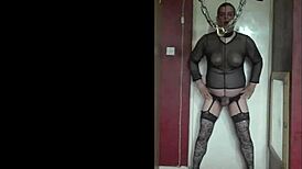 he stretches ballsacks in fishnets and stockings