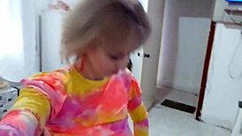 Blonde milf Stella Still rips clothes in sensual striptease dance.