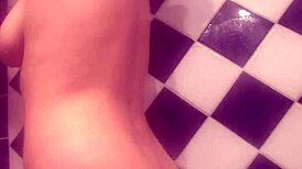 the busty girlfriend masturbates in shower solo