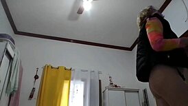 Blonde milf Stella Still rips clothes in sensual striptease dance.