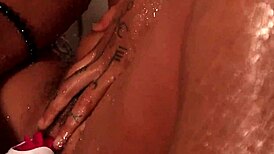 Taking a refreshing shower in the bathroom, feeling the warm water cascade over my body as I bathe peacefully