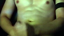 Gay Asian muscle twink jerking off and cumming hard