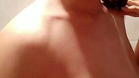 Amateur Babe Gives Footjob and Blowjob Before Fucking in Bathroom, Then Pisses on Him