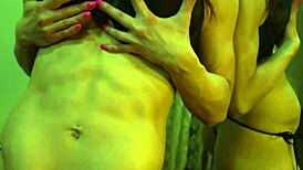 busty ginger shows off muscles in mirror