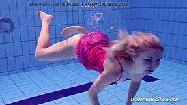 proklova strips bikini for underwater swim